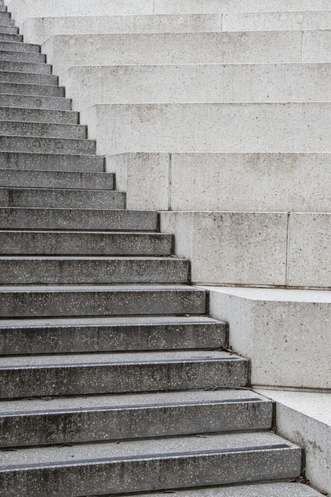 Concrete staircase captured in Melbourne, showcasing urban architectural design.